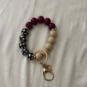 Burgandy and plaid beaded wristlet keychain